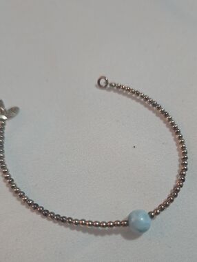 Beaded Silver Bracelet with Light Blue Accent Bead